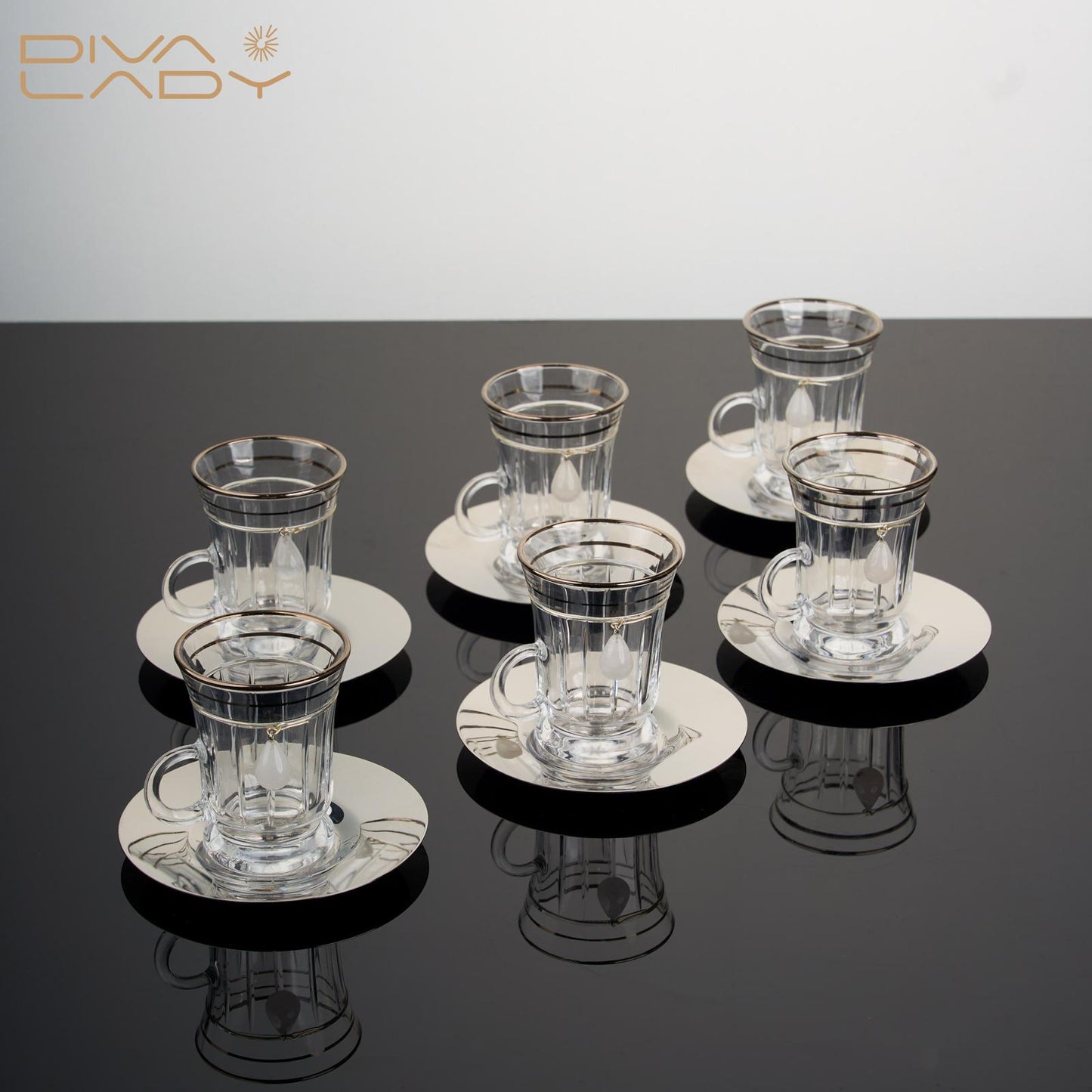 طقم استكانه و فنجان ١٨ قطعة فضى مع كريستال
