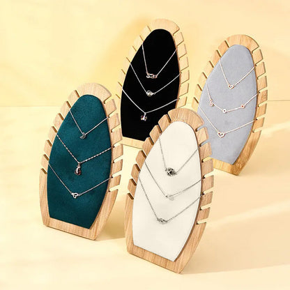 حامل المجوهرات على شكل أوراق النخيل