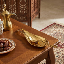 حامل ملعقة ذهبي