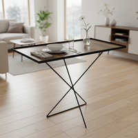 طاولة حديثة بتصميم معدني وسطح خشبي أنيق